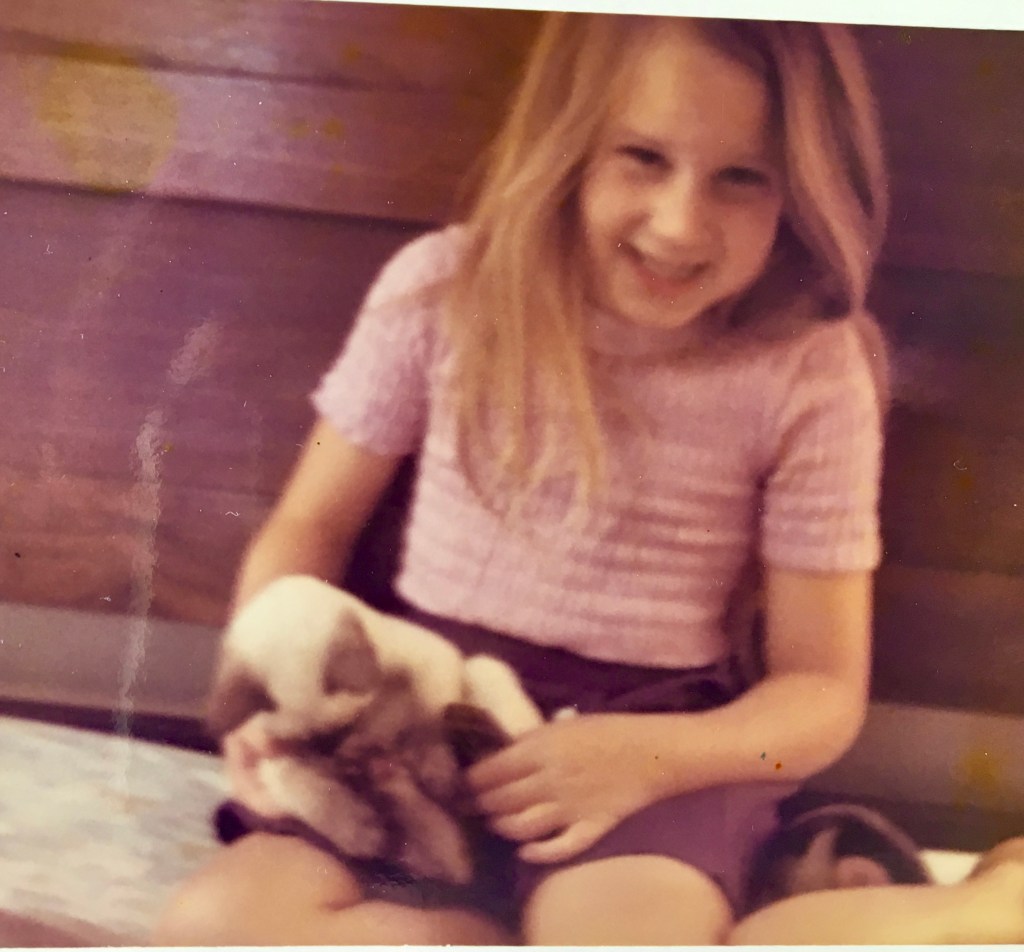 photo of J. Wilder Bill when a child with her kitten